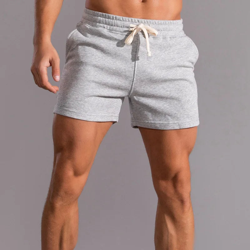 Pantalones cortos informales 100% de algodón para hombre, pantalones cortos de moda de alta calidad para hombre, pantalones cortos con bolsillos laterales y cremallera para correr al aire libre