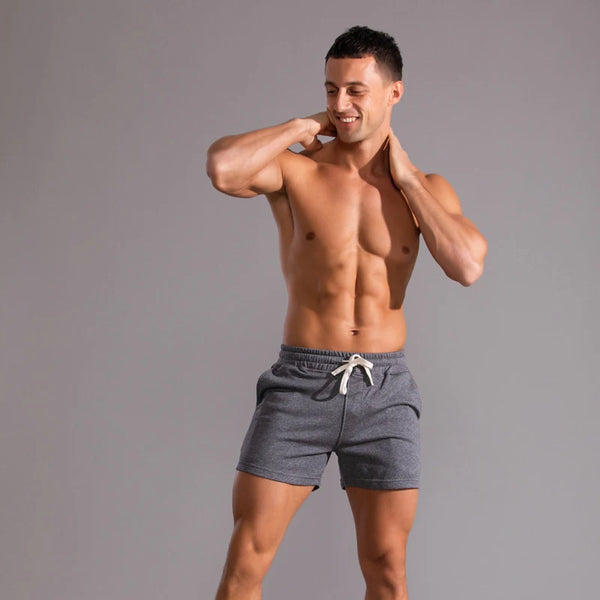 Pantalones cortos informales 100% de algodón para hombre, pantalones cortos de moda de alta calidad para hombre, pantalones cortos con bolsillos laterales y cremallera para correr al aire libre