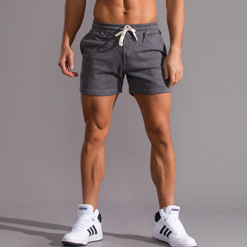 Pantalones cortos informales 100% de algodón para hombre, pantalones cortos de moda de alta calidad para hombre, pantalones cortos con bolsillos laterales y cremallera para correr al aire libre