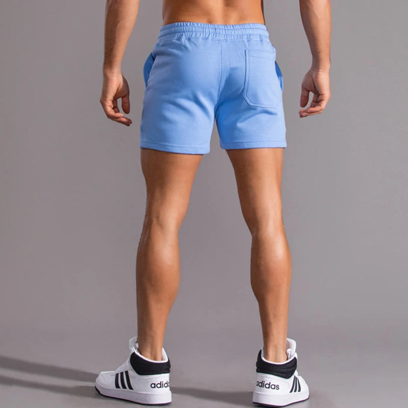 Pantalones cortos informales 100% de algodón para hombre, pantalones cortos de moda de alta calidad para hombre, pantalones cortos con bolsillos laterales y cremallera para correr al aire libre