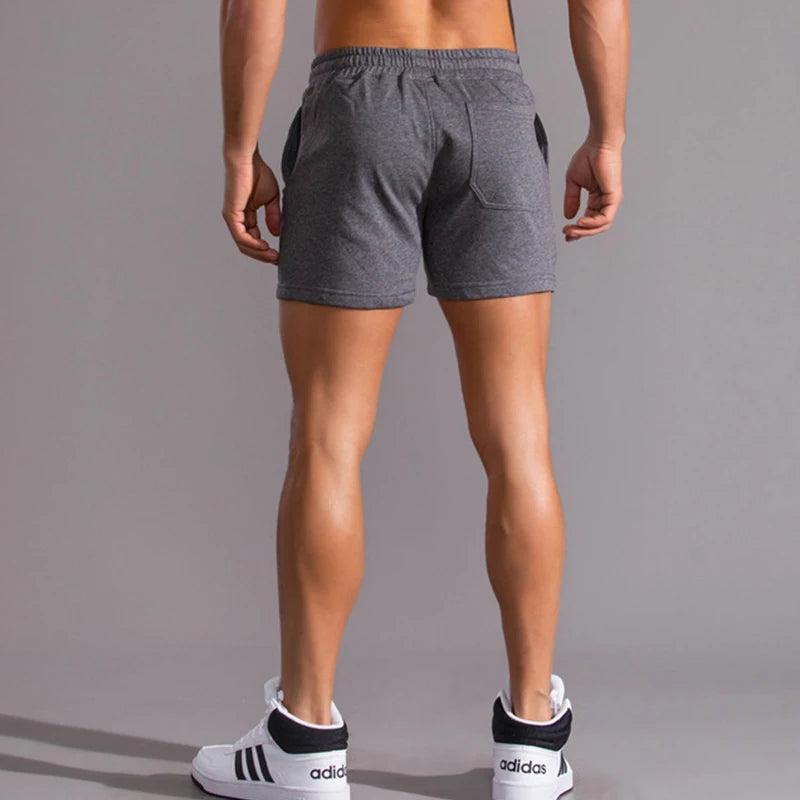 Pantalones cortos informales 100% de algodón para hombre, pantalones cortos de moda de alta calidad para hombre, pantalones cortos con bolsillos laterales y cremallera para correr al aire libre