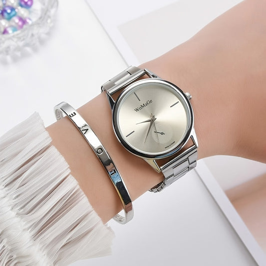 Conjunto reloj y pulsera de cuarzo plateados.